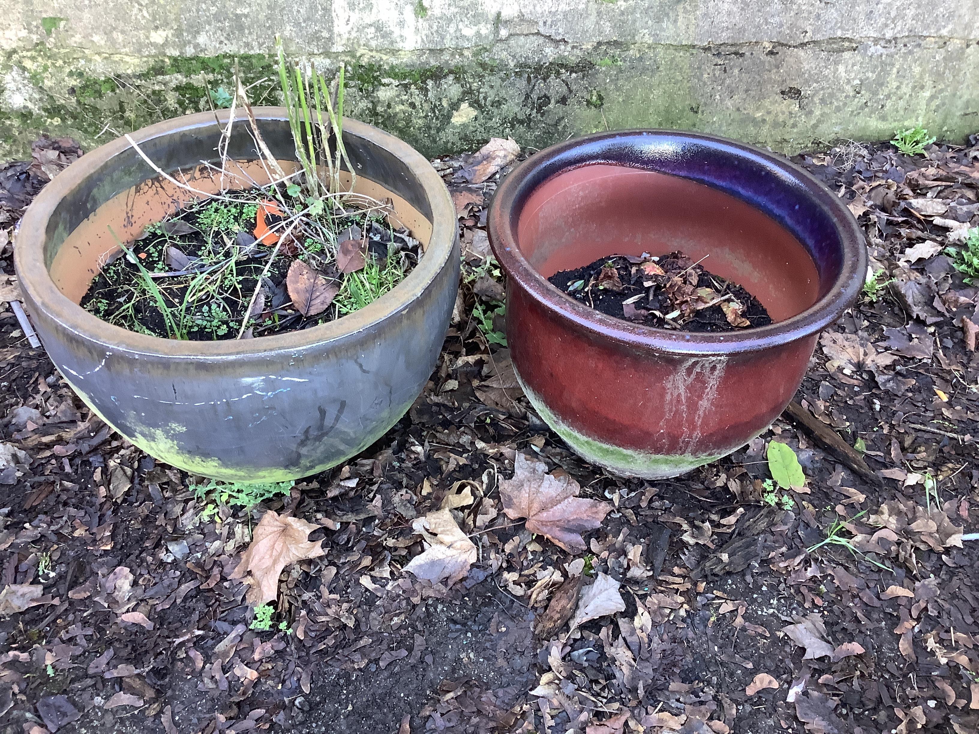 Two circular glazed earthenware garden planters, larger diameter 52cm, height 40cm